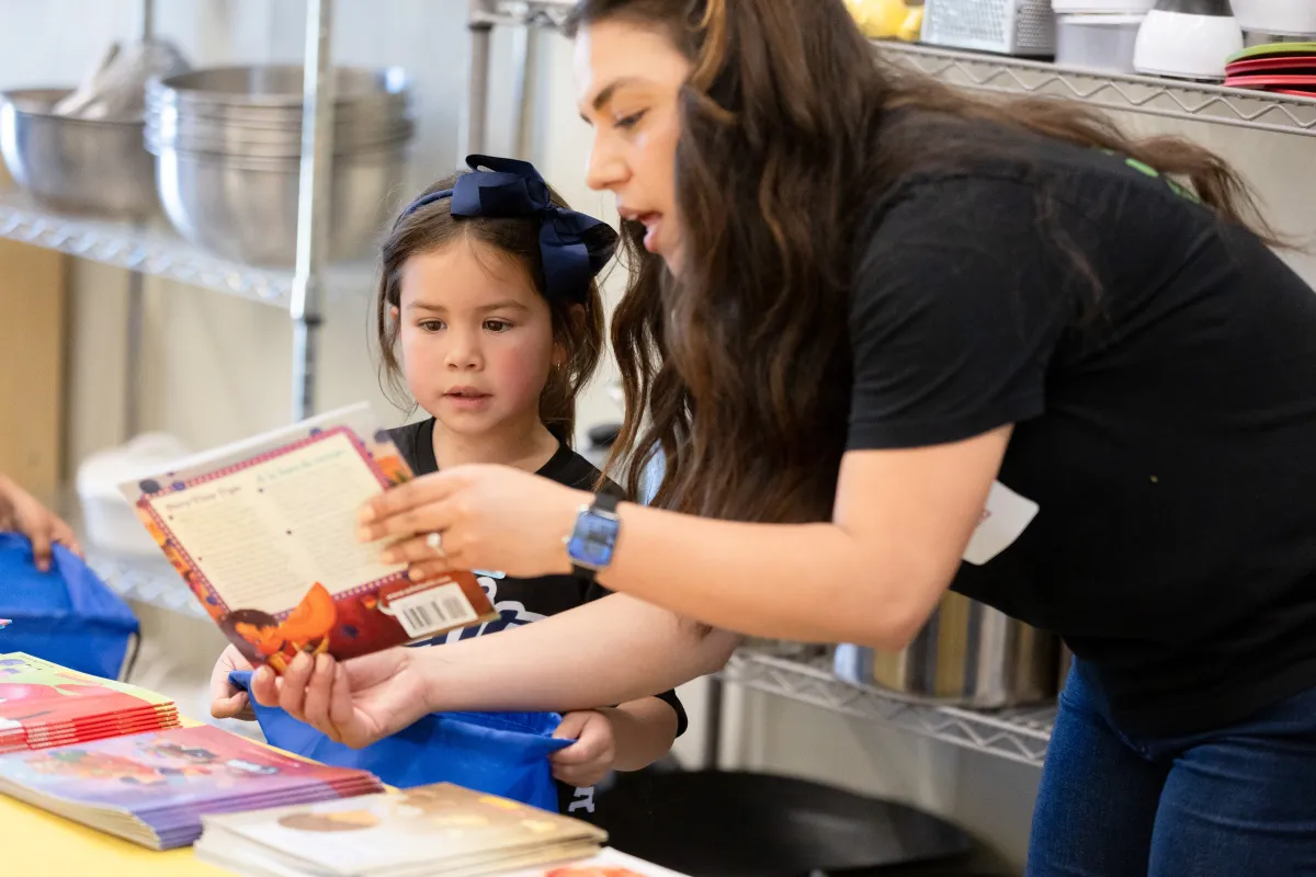 Girl looking at books