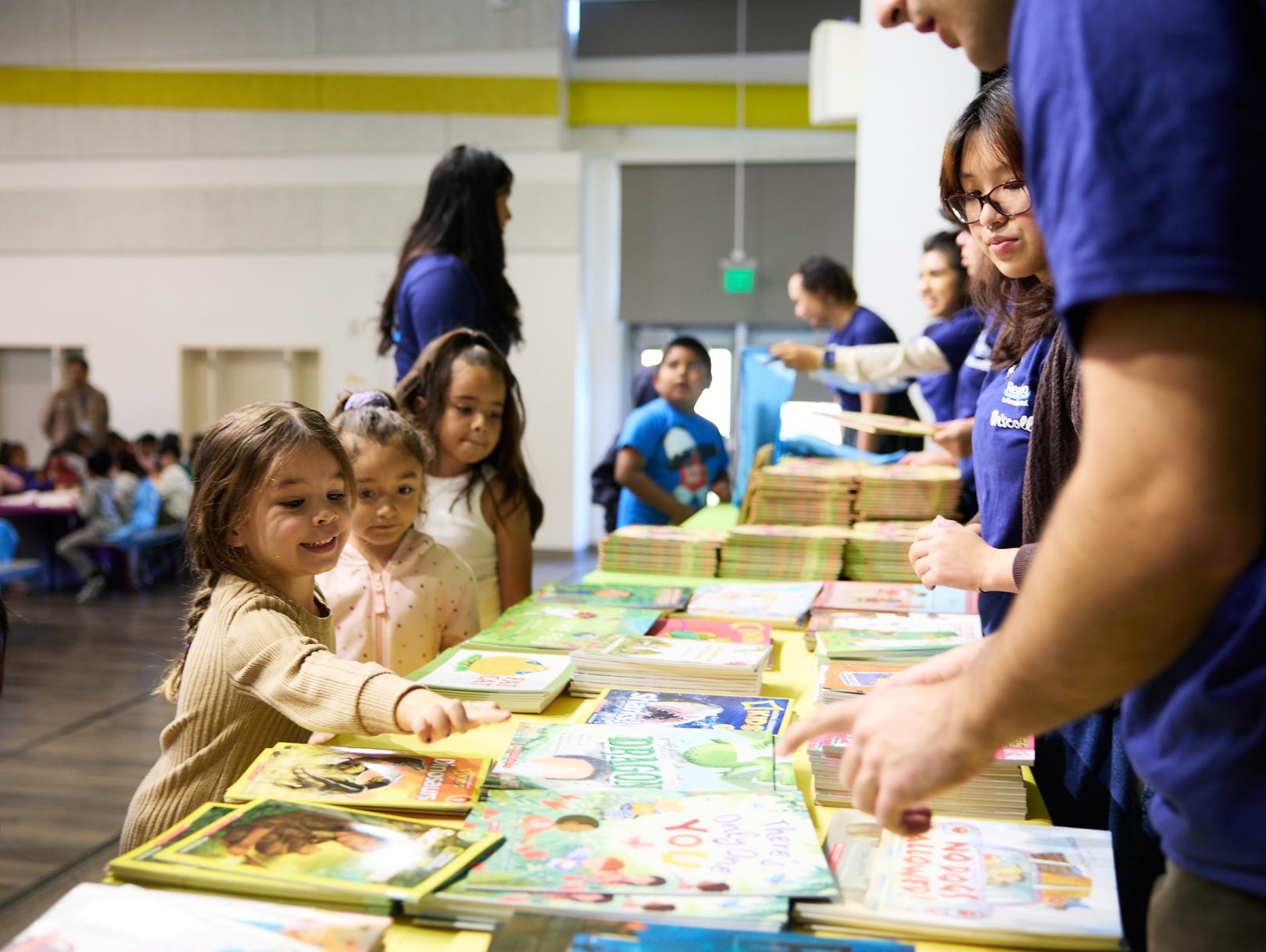 Girls picking their books