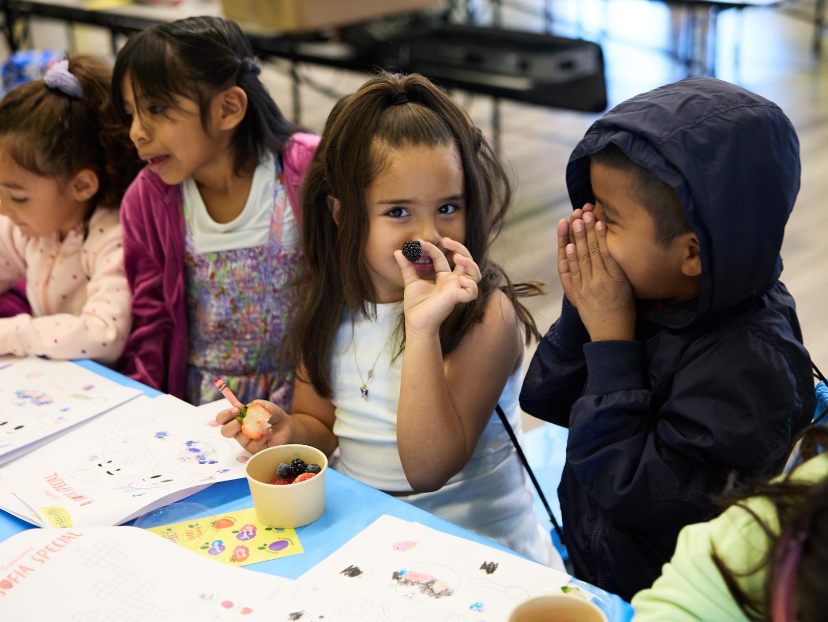 Girl showing off berries